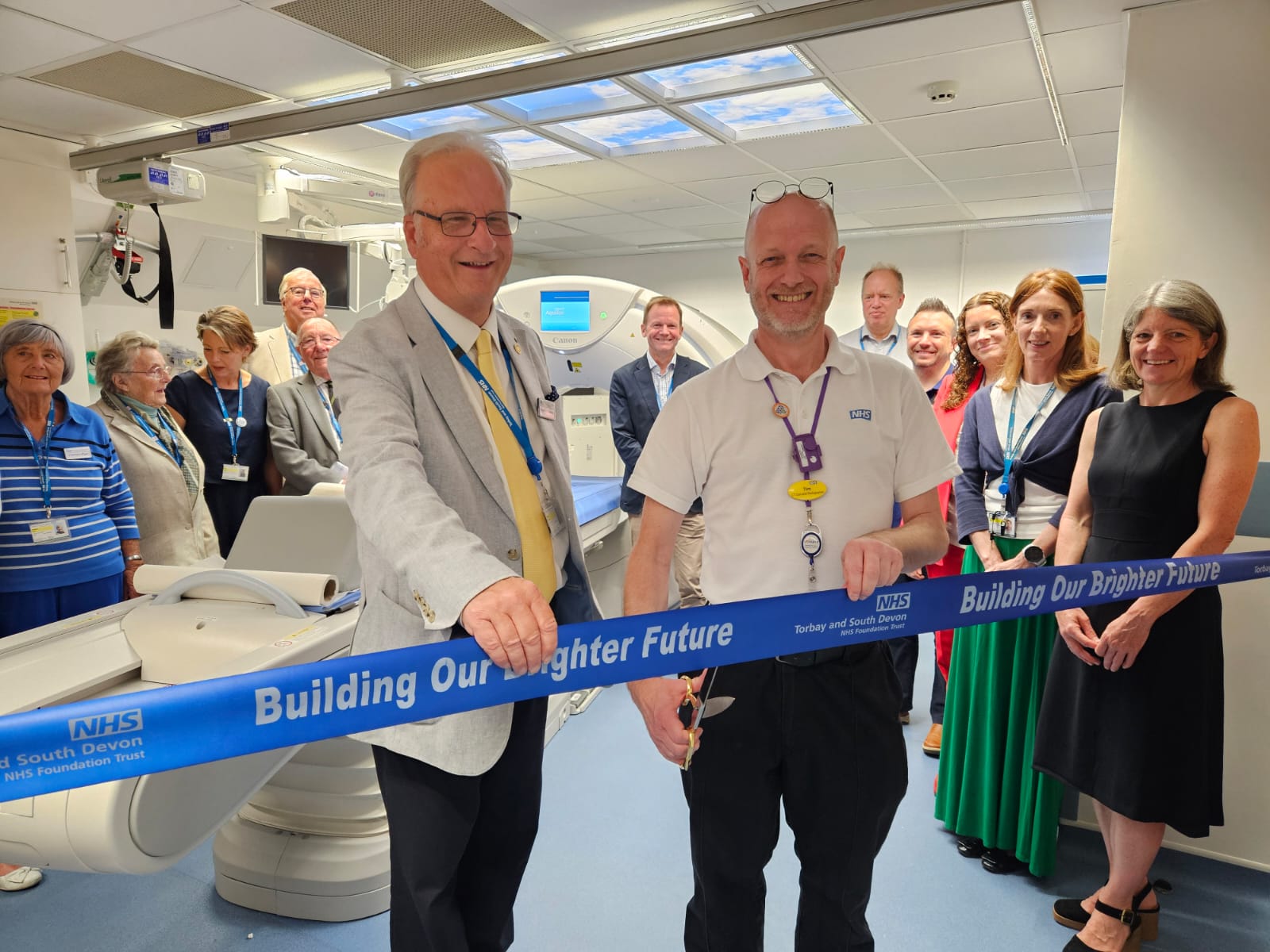 Ribbon cutting ceremony for the new CT scanner, with members of the Torbay Hospital League of Friends, the Executive Team, and colleagues from the Radiology and Imaging Department