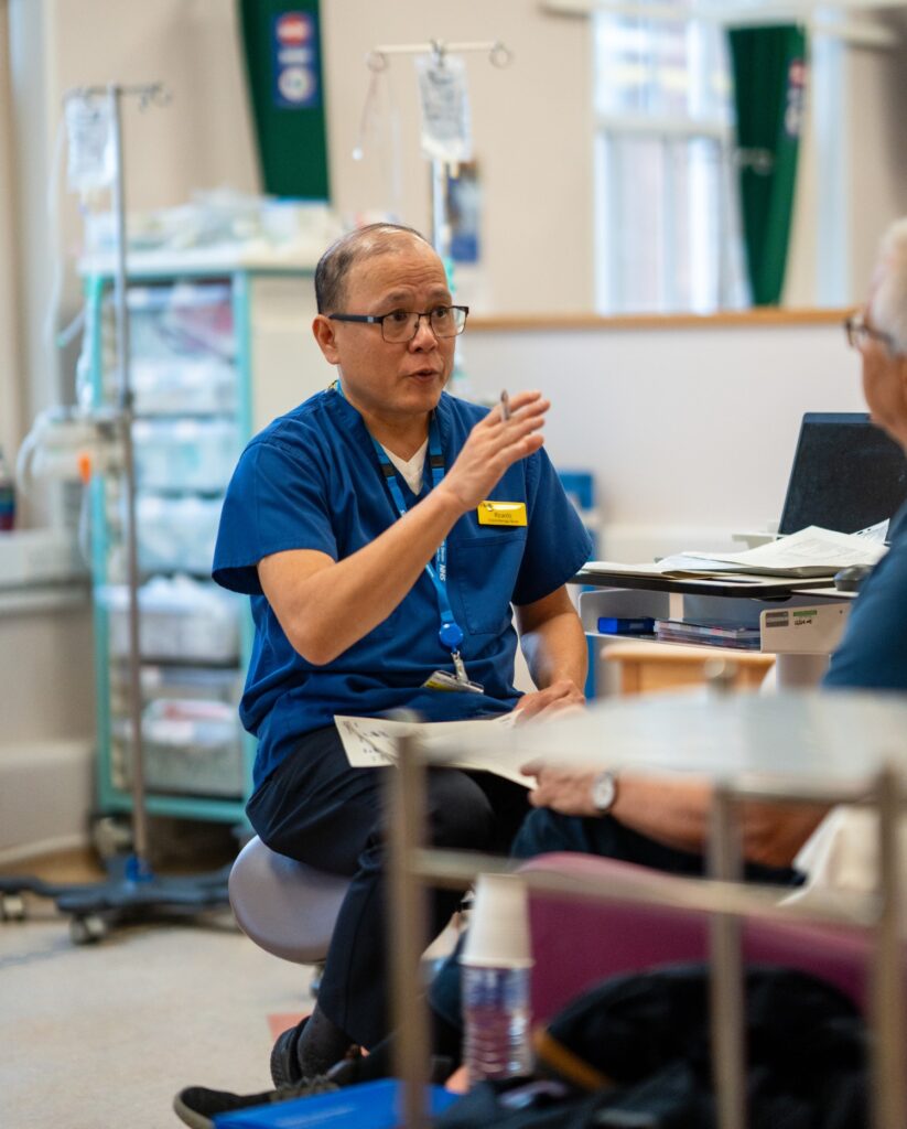 Chemotherapy Nurse talking to a patient