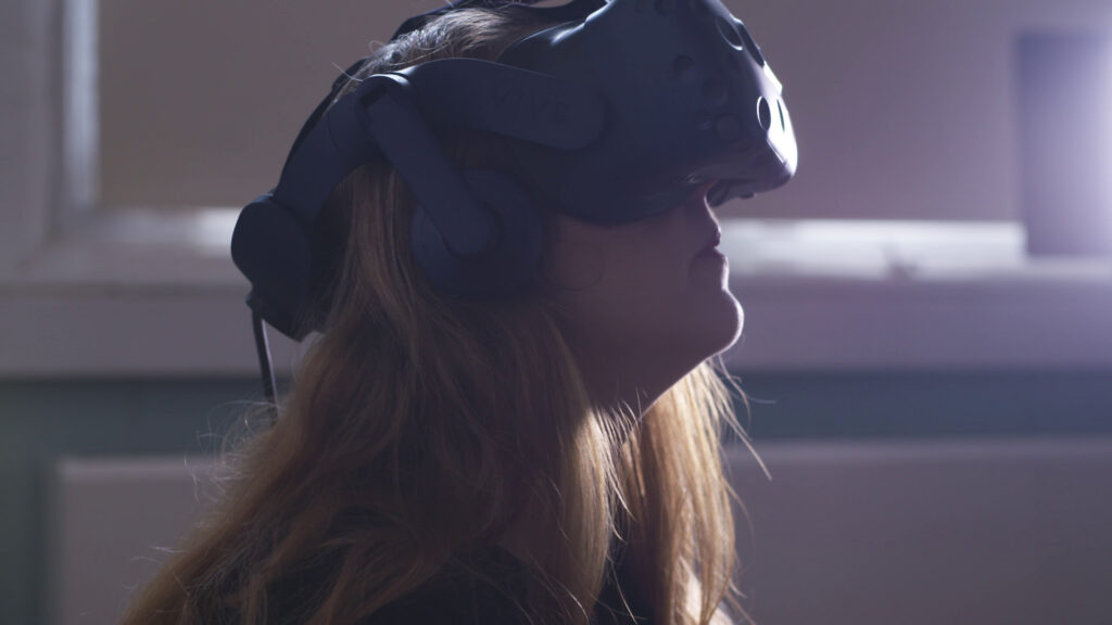 A person wearing a virtual reality headset