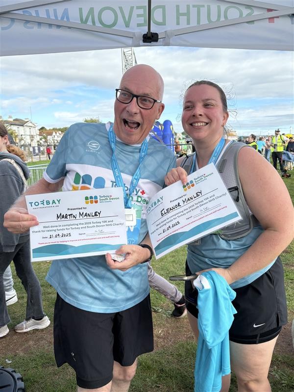 NHS Torbay Blue Wave runners Martin and Eleanor Manley