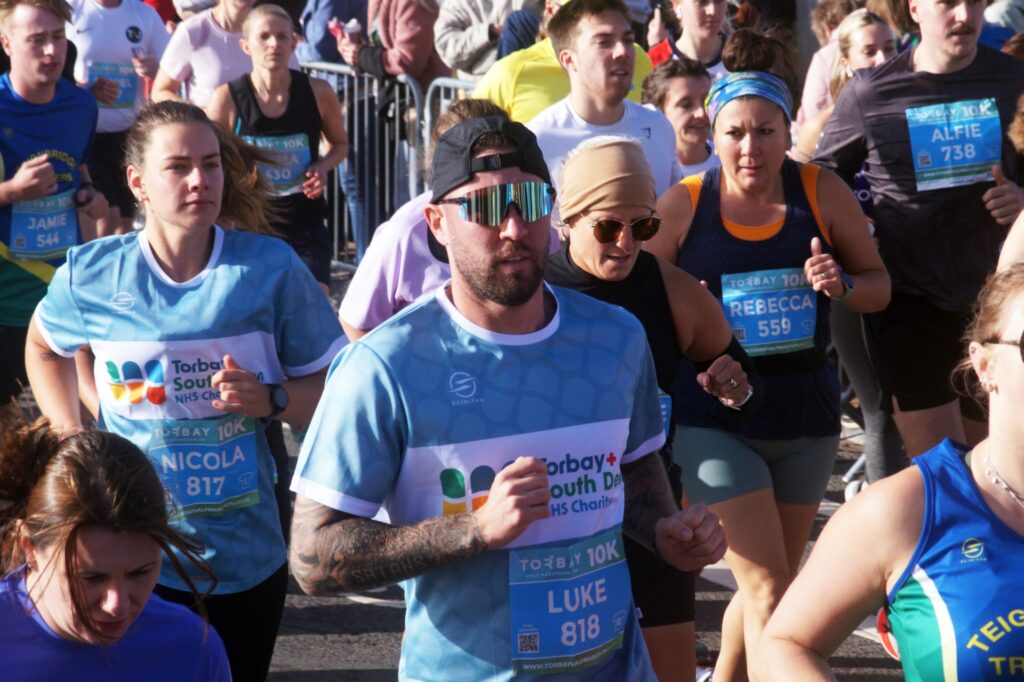 NHS Torbay Blue Wave runners Nicola Hill and Luke Kitching