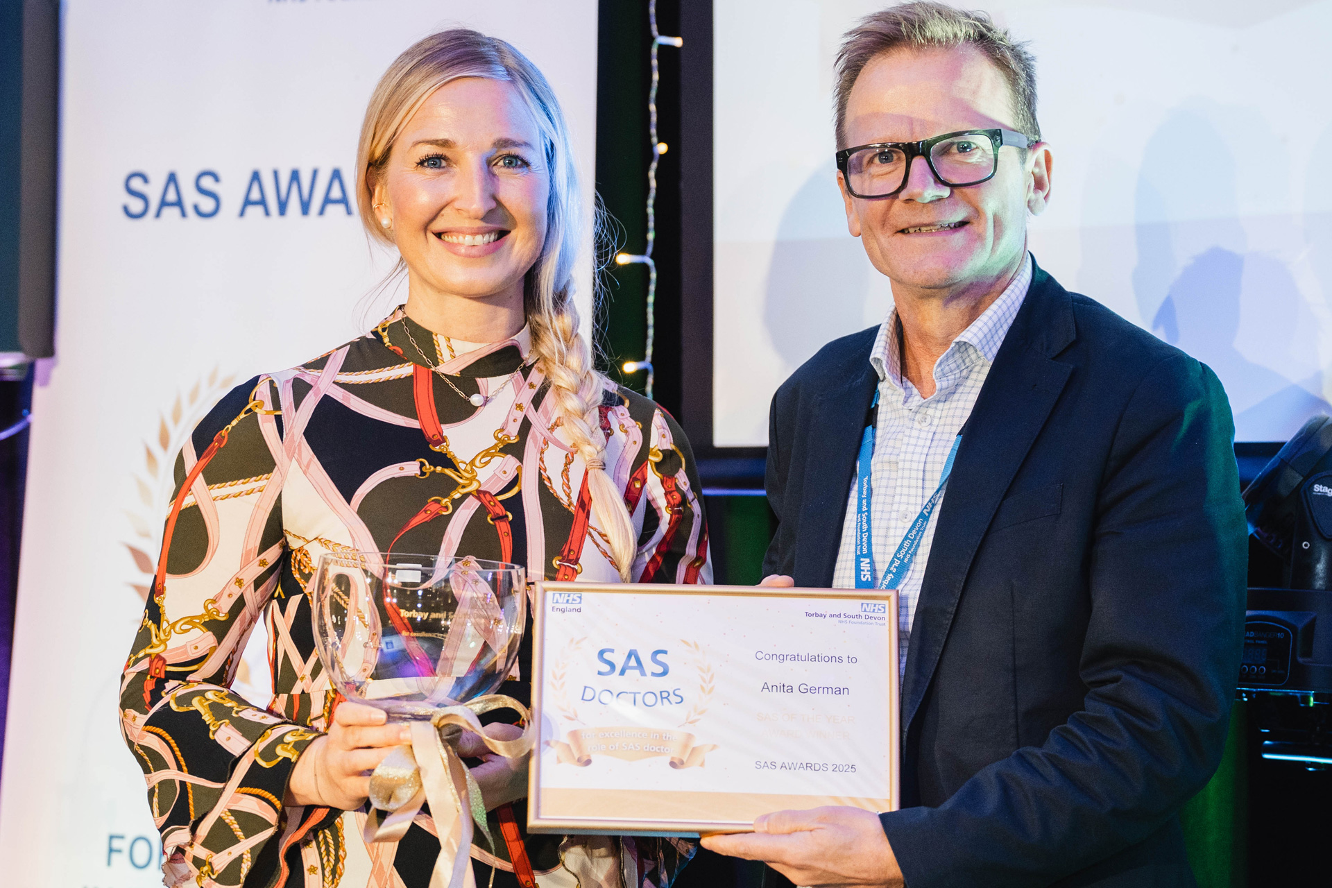 Joe Teape presenting Anita German with their award