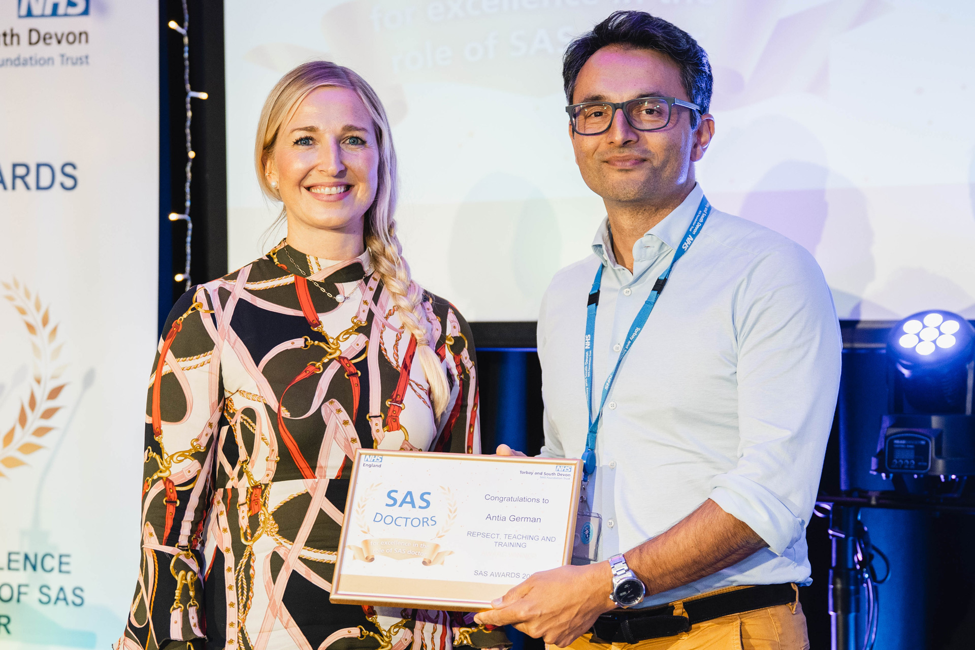 Anita German being presented with their award