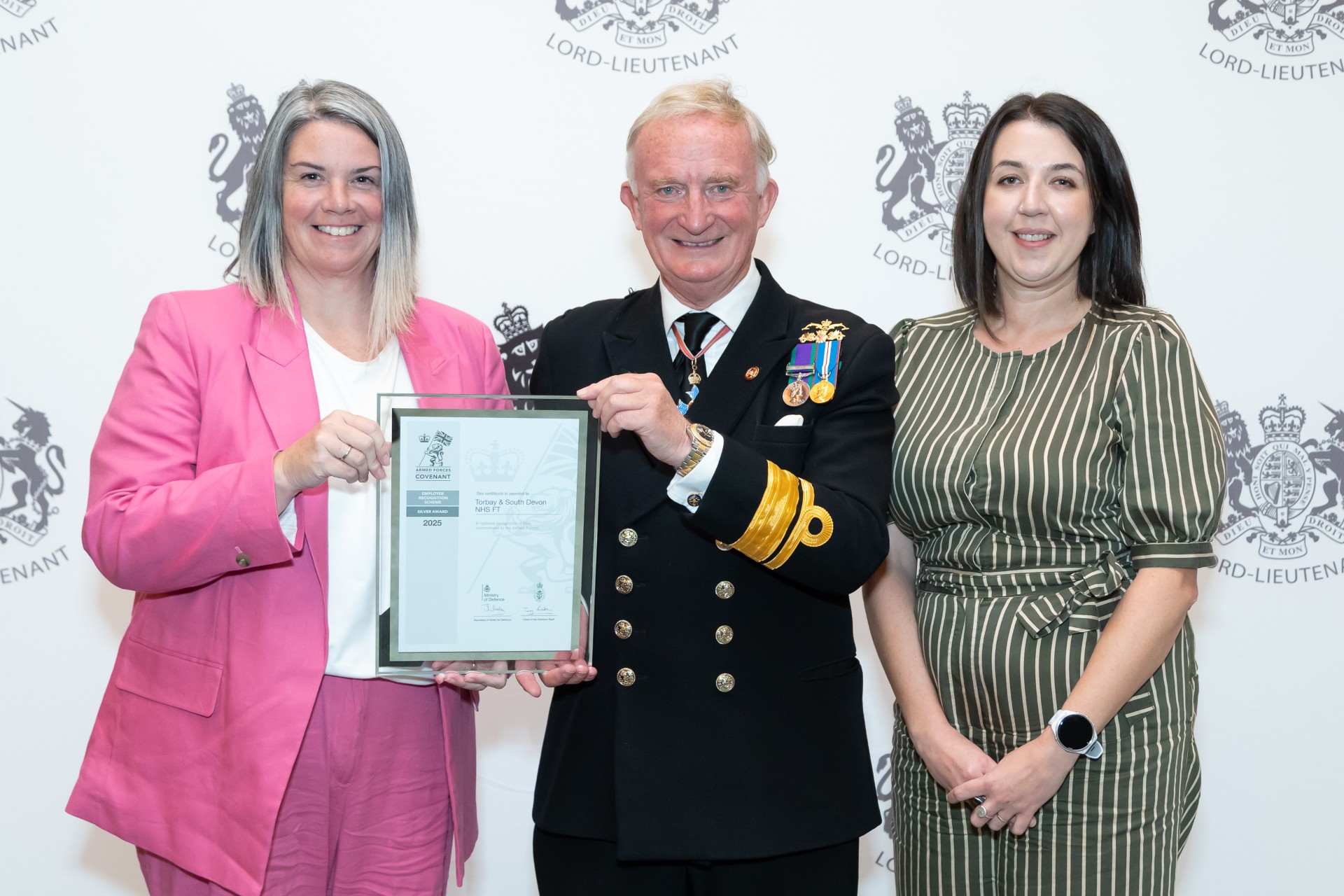 Natalie Herring, our Deputy Chief Nurse, and Laura Fuller, Deputy Director of People, accepting the Silver Employee Relations Scheme (ERS) award on behalf of our organisation at the Devon Lord-Lieutenant awards night.