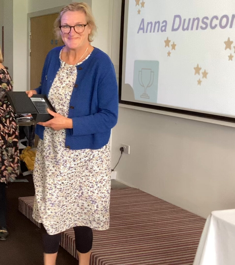 Photo of Anna Dunscombe with her award