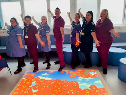 The Emergency Department team with our new interactive magic carpet, sensory projection system