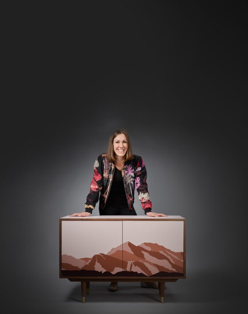 Artist Lucy Turner with one of her furniture pieces of art.