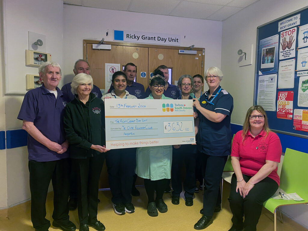 Ricky Grant Day Unit team being presented with a cheque by the Ye Old Roundham Club Paignton