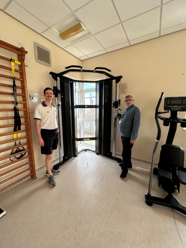 Pierre Le Poidevin, Senior MSK Physiotherapist and David Rogers, Chairman of Teignmouth Hospital League of Friends.