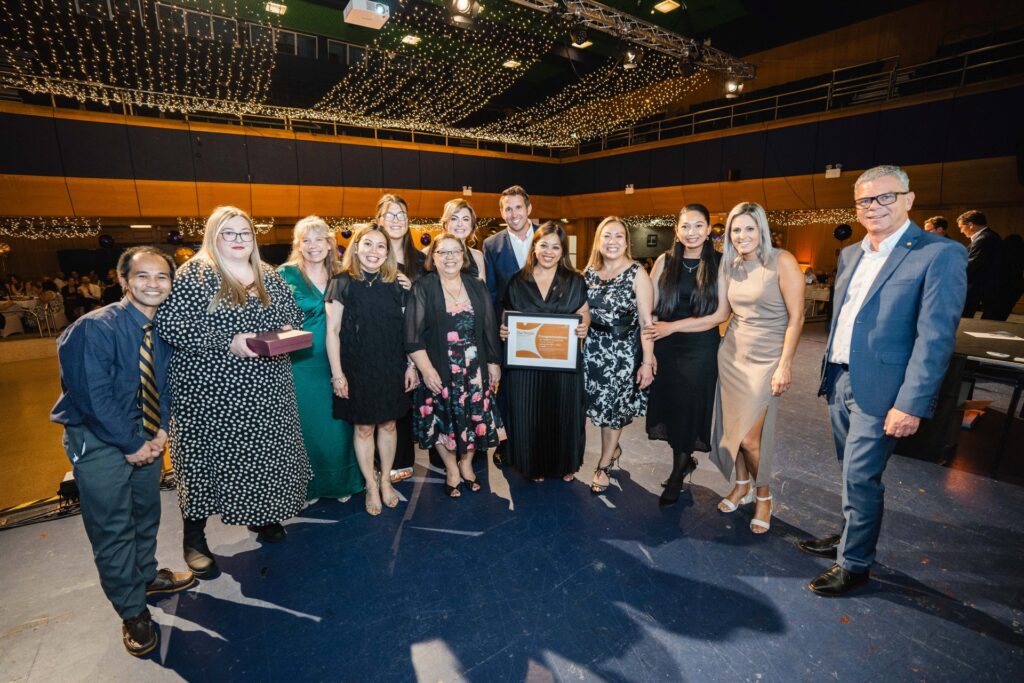 Colleagues from George Earle Ward being presented with their Our People's Choice Team award.