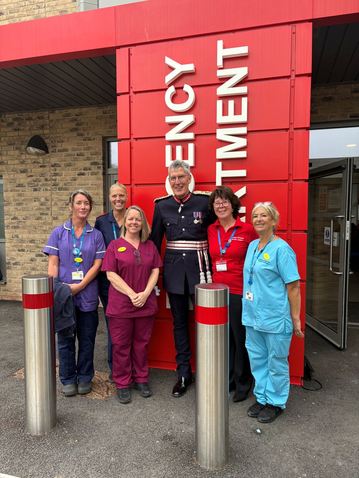 Group shot of people outside the Emergency Department at Torbay Hospital