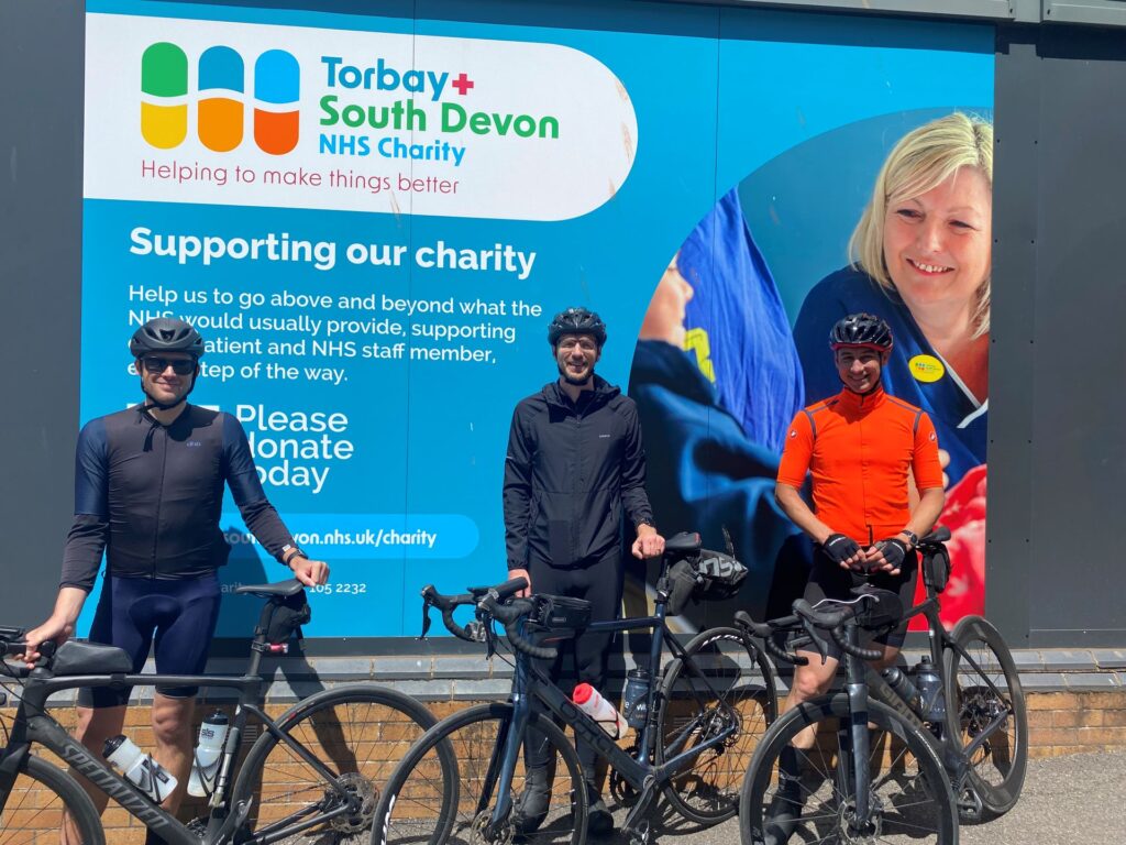 Simon, Steve and Chris with their bikes at Torbay Hospital