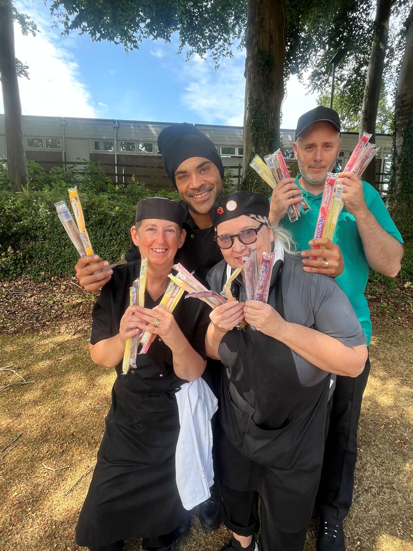 Four of our catering colleagues with ice pops