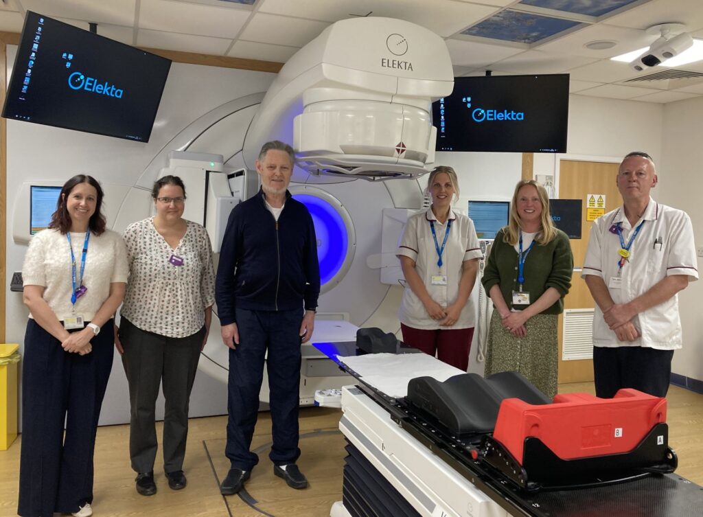 Stephen Dwyer-Lapthorne and Naomi Hopkins, Head of Radiotherapy, with colleagues from the Radiology Department